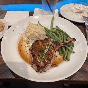 Stonewood Grill & Tavern - Bourbon Peach Pork Chop - New American Near Me - Ormond Beach, Florida