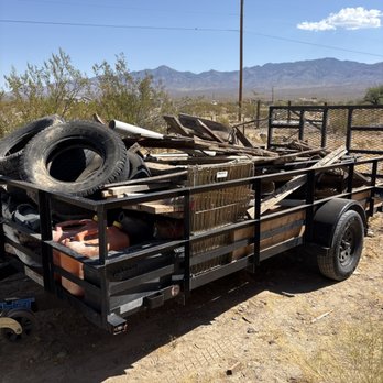 Green Bin Junk Removal - Full trailer of loose trash. - Junk Removal & Hauling Near Me - Las Vegas, Nevada Green Bin Junk Removal - Full trailer of loose trash. - Junk Removal & Hauling Near Me - Las Vegas, Nevada