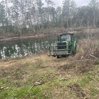 Hurst Tractor Services - Bushoging around pond - Lawn Services Near Me - Live Oak, Florida Hurst Tractor Services - Bushoging around pond - Lawn Services Near Me - Live Oak, Florida
