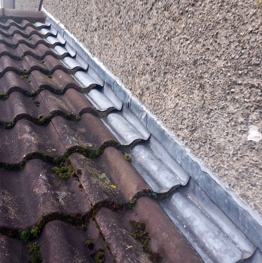 Slide of Pecan Park Roofing