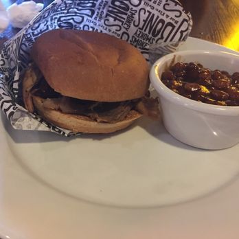 Smokey Bones - Pulled pork sandwich with baked beans - Barbeque Near Me - Orlando, Florida Smokey Bones - Pulled pork sandwich with baked beans - Barbeque Near Me - Orlando, Florida