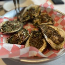 The Grilled Oyster - Trio of grilled oysters.
