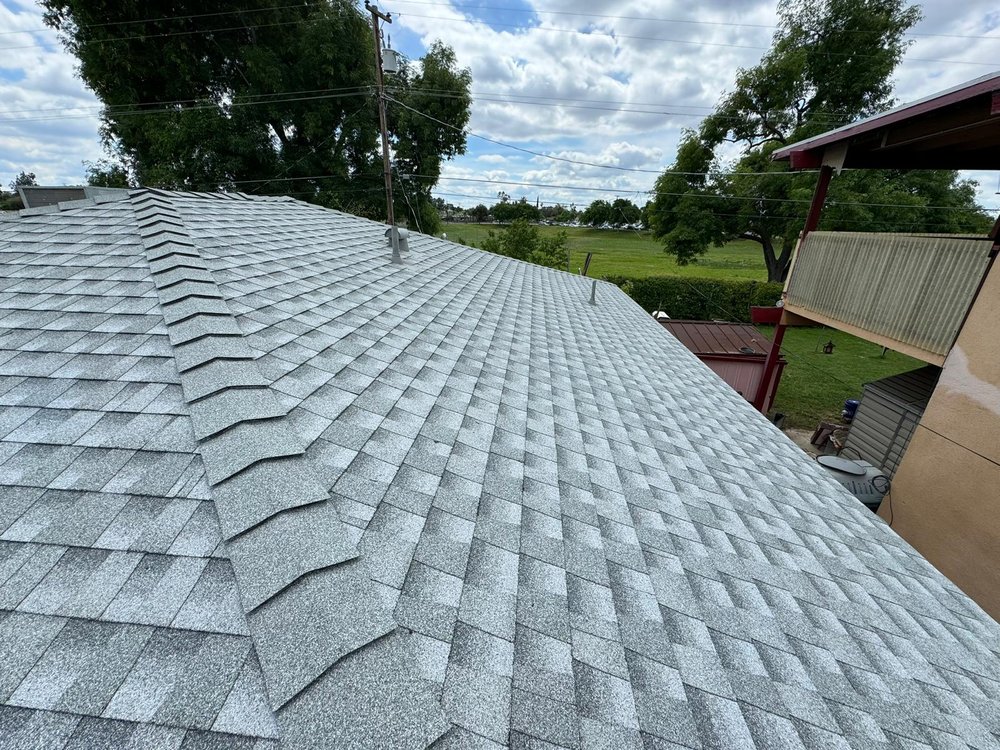 Slide of TAAG Roofing