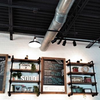 Foxtail Coffee - This is the right side of the menu board and it shows brews, teas, and specialty drinks. - Coffee & Tea Near Me - Orlando, Florida