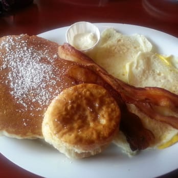 Stacks Kitchen - Pancake combo meal with two pancakes, three slice of bacon, 3 eggs, and a biscuit. - Breakfast & Brunch Near Me - Matthews, North Carolina Stacks Kitchen - Pancake combo meal with two pancakes, three slice of bacon, 3 eggs, and a biscuit. - Breakfast & Brunch Near Me - Matthews, North Carolina