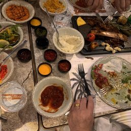 Sides and sauces plus a beef shank Sides and sauces plus a beef shank