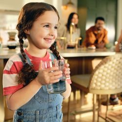 Little girl enjoying Culligan drinking water