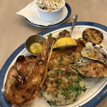 Lure Fish House - coastal grill platter with parmesan potato cake and pineapple coleslaw - Seafood Near Me - Scottsdale, Arizona
