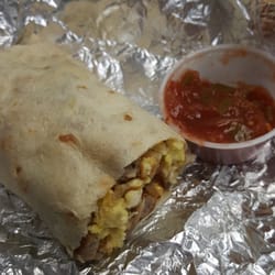 The Food Truck - This is only half of the breakfast burrito. All made from scratch on the flat top. was excellent