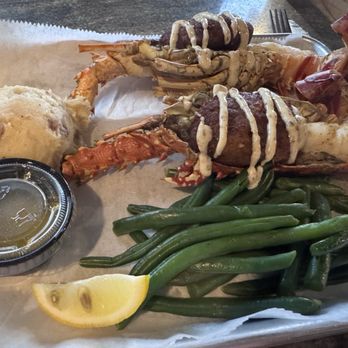 Dewey Destin Seafood - Special stuffed lobster tail with mashed potatoes and green beans. - Seafood Near Me - Destin, Florida