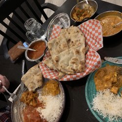 Amaya Express Burlington - Butter chicken, aloo gobi and Shahi paneer with plain rice and naan. Not pictured is the app and dessert.
