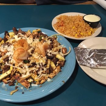 Garcia's Mexican Restaurant - The Parillado! We split what's on the blue plate with a 2nd order of rice. - Mexican Near Me - Frankfort, Kentucky Garcia's Mexican Restaurant - The Parillado! We split what's on the blue plate with a 2nd order of rice. - Mexican Near Me - Frankfort, Kentucky