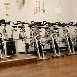 SNAP Fitness - Kentwood - Group fitness room with stationary bikes for spin class.
