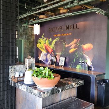 Hotel Nell – Union Market - Front desk greets weary travelers with lemon or cucumber infused water - Hotels Near Me - Washington, DC, District of Columbia Hotel Nell – Union Market - Front desk greets weary travelers with lemon or cucumber infused water - Hotels Near Me - Washington, DC, District of Columbia