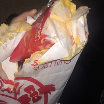 Wendy's - cheese cups with no lids, leaked right thru bag and ripped right thru the bottom. not even correct order, cheese is just watery - Burgers Near Me - Tacoma, Washington