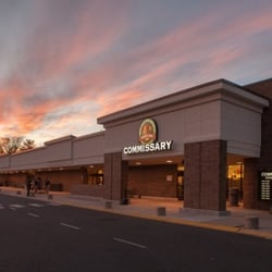 McGuire AFB Commissary - Front entrance & loading area in the foreground and evening sky with the sunset in the background.