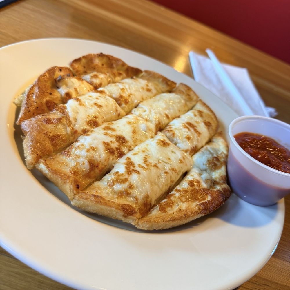 Old Chicago Pizza + Taproom - CHEESY DIPPIN' STRIPS - Pizza Near Me - Columbia, South Carolina Old Chicago Pizza + Taproom - CHEESY DIPPIN' STRIPS - Pizza Near Me - Columbia, South Carolina
