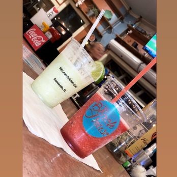 The Beach House - two drinks on a table - American Near Me - Miramar Beach, Florida The Beach House - two drinks on a table - American Near Me - Miramar Beach, Florida