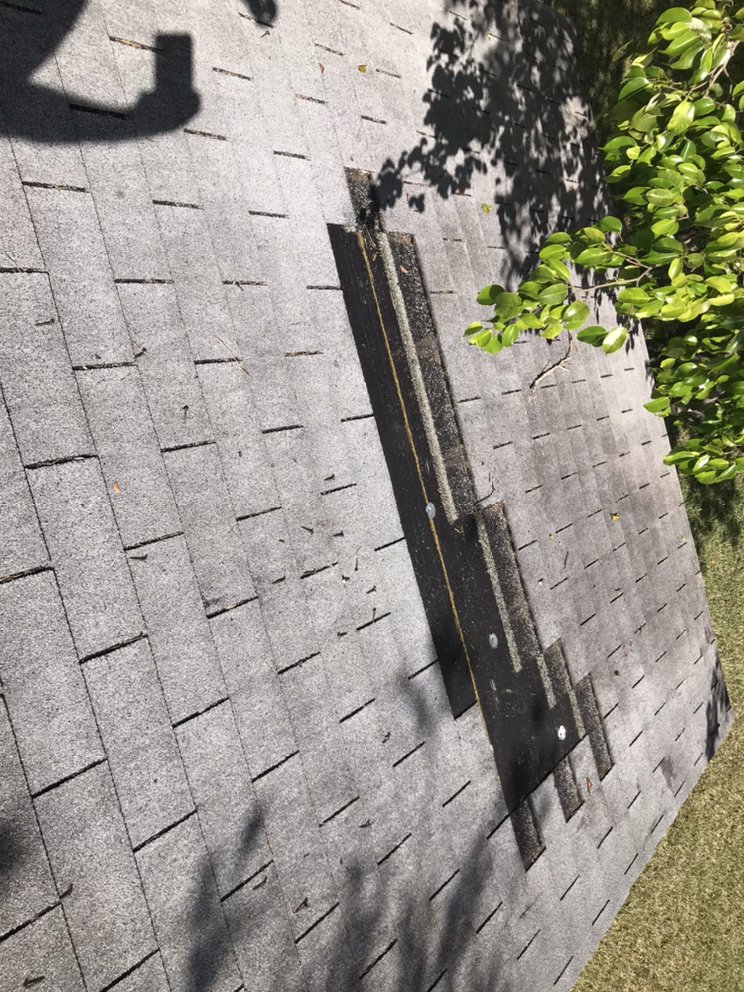 Slide of Andy The Roofer & Co