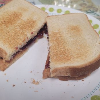 Cafe Latte da - PB&J TOAST: A toasted peanut butter and jelly sandwich served with white bread and toasted. - Coffee & Tea Near Me - Sebastian, Florida