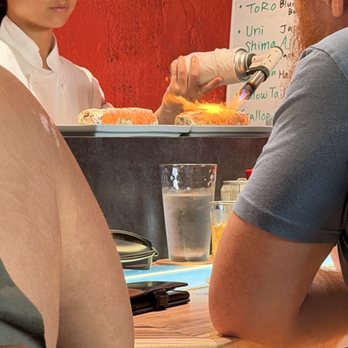 YA!!SUSHI - Searing the salmon - Sushi Bars Near Me - Honolulu, Hawaii YA!!SUSHI - Searing the salmon - Sushi Bars Near Me - Honolulu, Hawaii