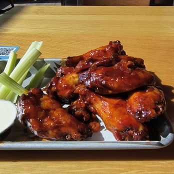 BJ's Restaurant & Brewhouse - Bacon Onion Jam Chicken Wings - Breweries Near Me - Grand Rapids, Michigan BJ's Restaurant & Brewhouse - Bacon Onion Jam Chicken Wings - Breweries Near Me - Grand Rapids, Michigan