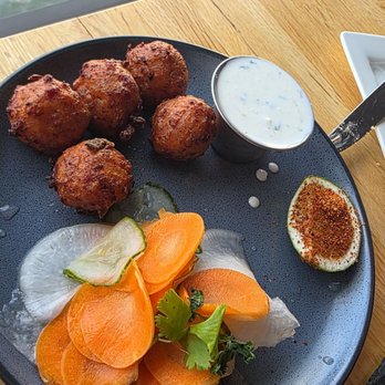 Rusty Pelican - Key west conch fritters - Seafood Near Me - Tampa, Florida Rusty Pelican - Key west conch fritters - Seafood Near Me - Tampa, Florida