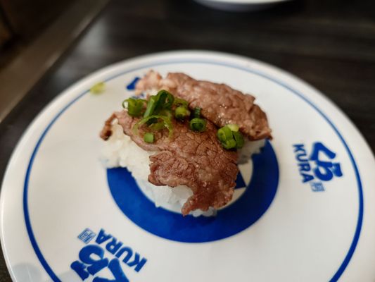 Kura Revolving Sushi Bar by null