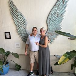 Story & Song Neighborhood Bookstore Bistro - Pegasus wings out front