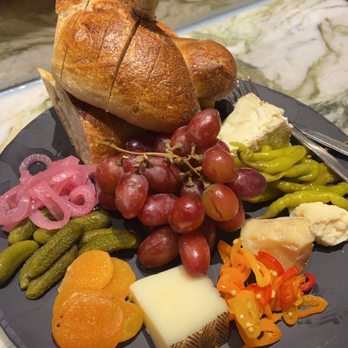 Cheese Meet Wine - Build your own charcuterie board with camembert, manchego, and clothbound cheddar cheeses - Cheese Shops Near Me - Everett, Massachusetts