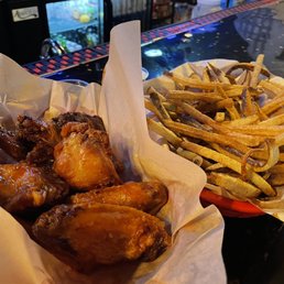 Mango habanero wings with fresh cut fries