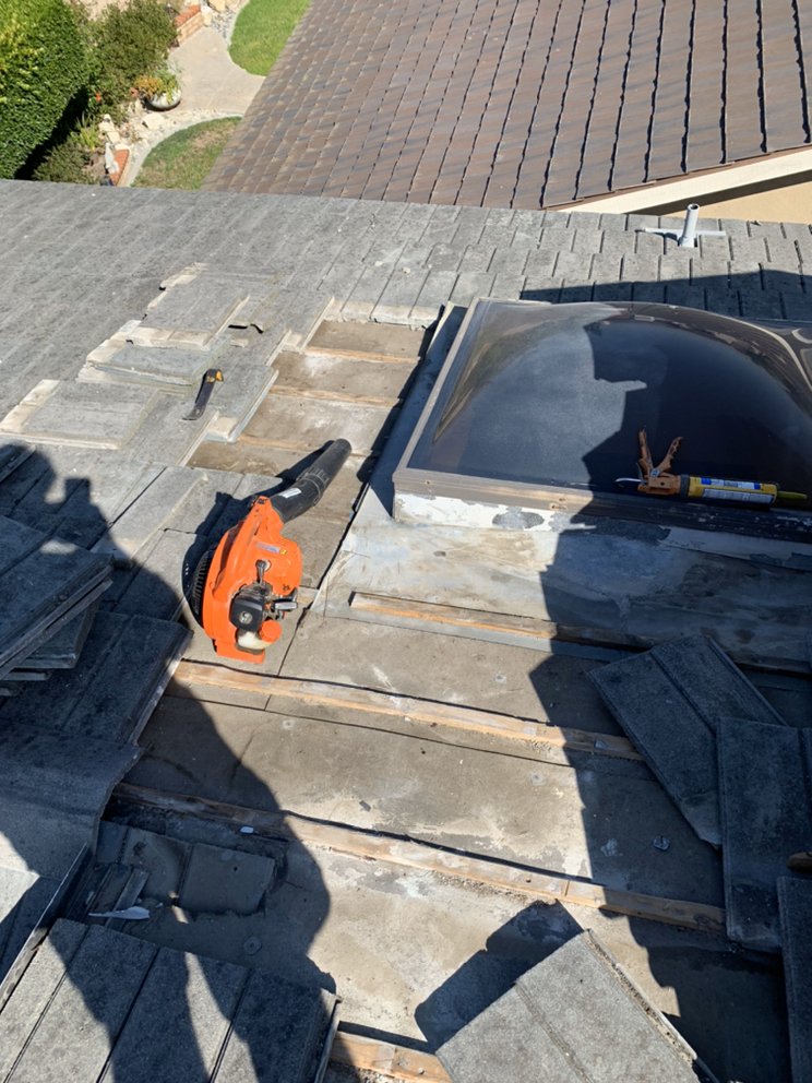 Slide of Century Roofing Company