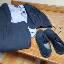 New King Wok - This is picture of suit and shoes worn once