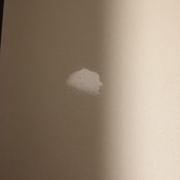 White patches that are badly done.  Cannot even paint over!