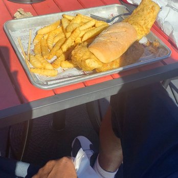 Tiki Docks Riverview - Gigantic fish sandwich & crinkle cut fries. - Salad Near Me - Riverview, Florida Tiki Docks Riverview - Gigantic fish sandwich & crinkle cut fries. - Salad Near Me - Riverview, Florida