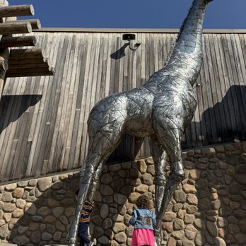 Seneca Park Zoo - Giraffe statue outside of one of the buildings. - Zoos Near Me - Rochester, New York Seneca Park Zoo - Giraffe statue outside of one of the buildings. - Zoos Near Me - Rochester, New York