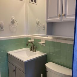 New vanity, mirror, and cabinet!