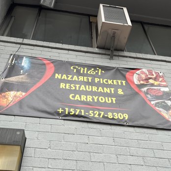 Nazret Kitfo - a banner on the side of a building - Ethiopian Near Me - Alexandria, Virginia Nazret Kitfo - a banner on the side of a building - Ethiopian Near Me - Alexandria, Virginia