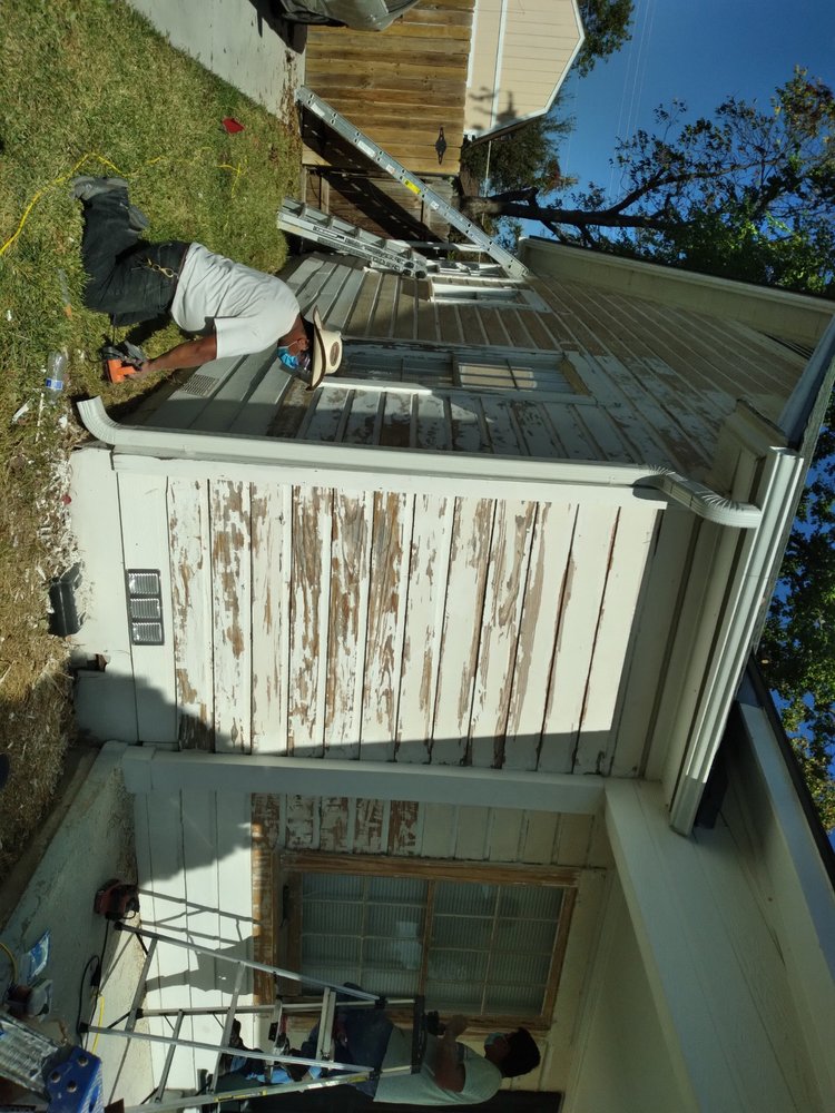 Slide of New Millennium House Remodeling