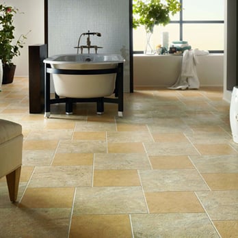 Olympic Carpet - a bathroom with a tub and a chair - Flooring Near Me - El Cajon, California Olympic Carpet - a bathroom with a tub and a chair - Flooring Near Me - El Cajon, California