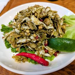 Salad Daun Teh Hijau (green tea leaf salad w.cabbage, tomatoes, beans & green chillies) $14