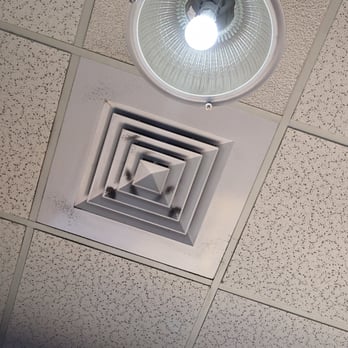 Discount Tire - One of the milder vents and light fixtures... But spider webs on the lights, mold spores on the vents. - Tires Near Me - Austin, Texas