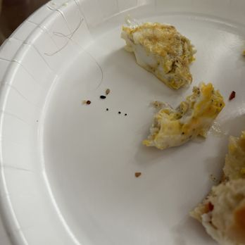 The Bagel Shop - Curly dark hair and small black hair in breakfast sandwich. - Bagels Near Me - Cape May, New Jersey