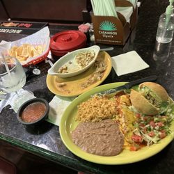 Casa Tapatia Mexican Restaurant & Bar - Stuffed Avocado (best seller) and what's left of the queso