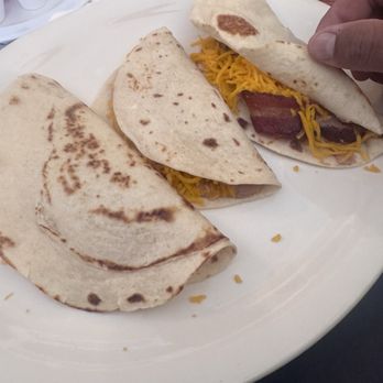 Pete's Tako House - Bean and cheese tacos with bacon  The tortillas are homemade with the San Antonio taste - Breakfast & Brunch Near Me - San Antonio, Texas