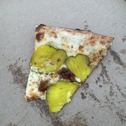 Pizza week: Cheese, pickle chips, and fried chicken tenders tossed in a spicy house Nashville hot sauce and honey. Pizza week: Cheese, pickle chips, and fried chicken tenders tossed in a spicy house Nashville hot sauce and honey.