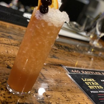 Lone Star Axe Throwing - a drink on a bar - Axe Throwing Near Me - Dallas, Texas