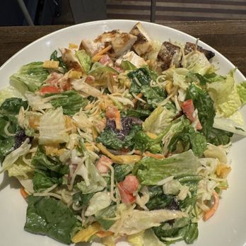 Joe’s Waterfront - Salad with chicken on it. Large portion and good! - Burgers Near Me - Boston, Massachusetts Joe’s Waterfront - Salad with chicken on it. Large portion and good! - Burgers Near Me - Boston, Massachusetts