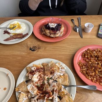 Otra Vez - Chilaquiles , potatoes& blueberry pancakes w eggs and bacon . - Breakfast & Brunch Near Me - Camas, Washington