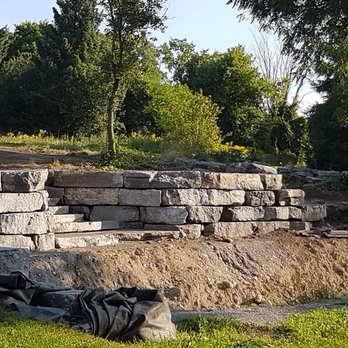 The Landscape Group - Retaining wall with stairs incorporated (natural stone) - Landscaping Near Me The Landscape Group - Retaining wall with stairs incorporated (natural stone) - Landscaping Near Me